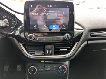 Photo 19 du bon plan FORD Fiesta 1.0 Flexifuel 95ch Titanium Business 5p occasion à 12980 €