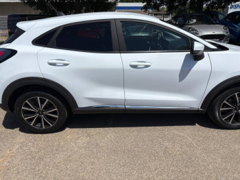Photo 8 du bon plan FORD Puma 1.0 Flexifuel 125ch S&S mHEV Titanium occasion à 15990 €